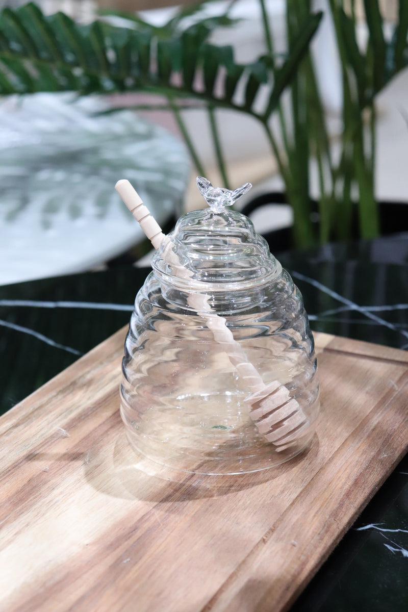 Honigdose mit Honiglöffel