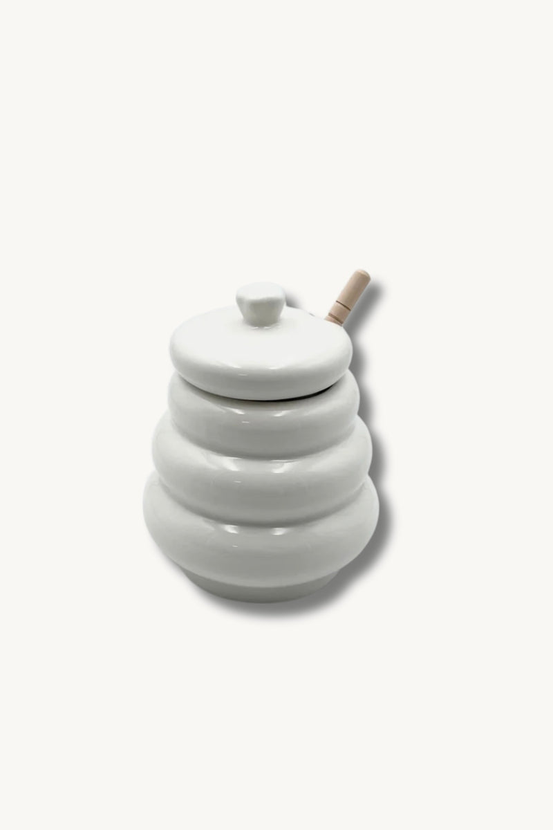 Honigdose aus Porzellan mit Honiglöffel